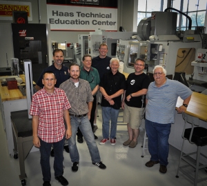 “Taking time out to stop for a pose during the latest Machine Tool workshops at the Haas Technical Educator Center at Vincennes University in Vincennes, Indiana are, from left, Randy Emert, Kennesaw State University; Doug Bowen, Vincennes University; Ben Whitener, Athens Technical College; Ed Kishka, Athens Technical College; Phillip Shirley, Georgia Northwestern Technical College Stuart Rolf, Athens Technical College; Jeffrey Friend, Savannah Technical College; and Chris Gibbs, Coastal Pines Technical College.”
